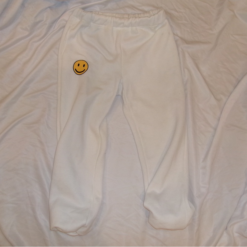white smiley face sweatpants